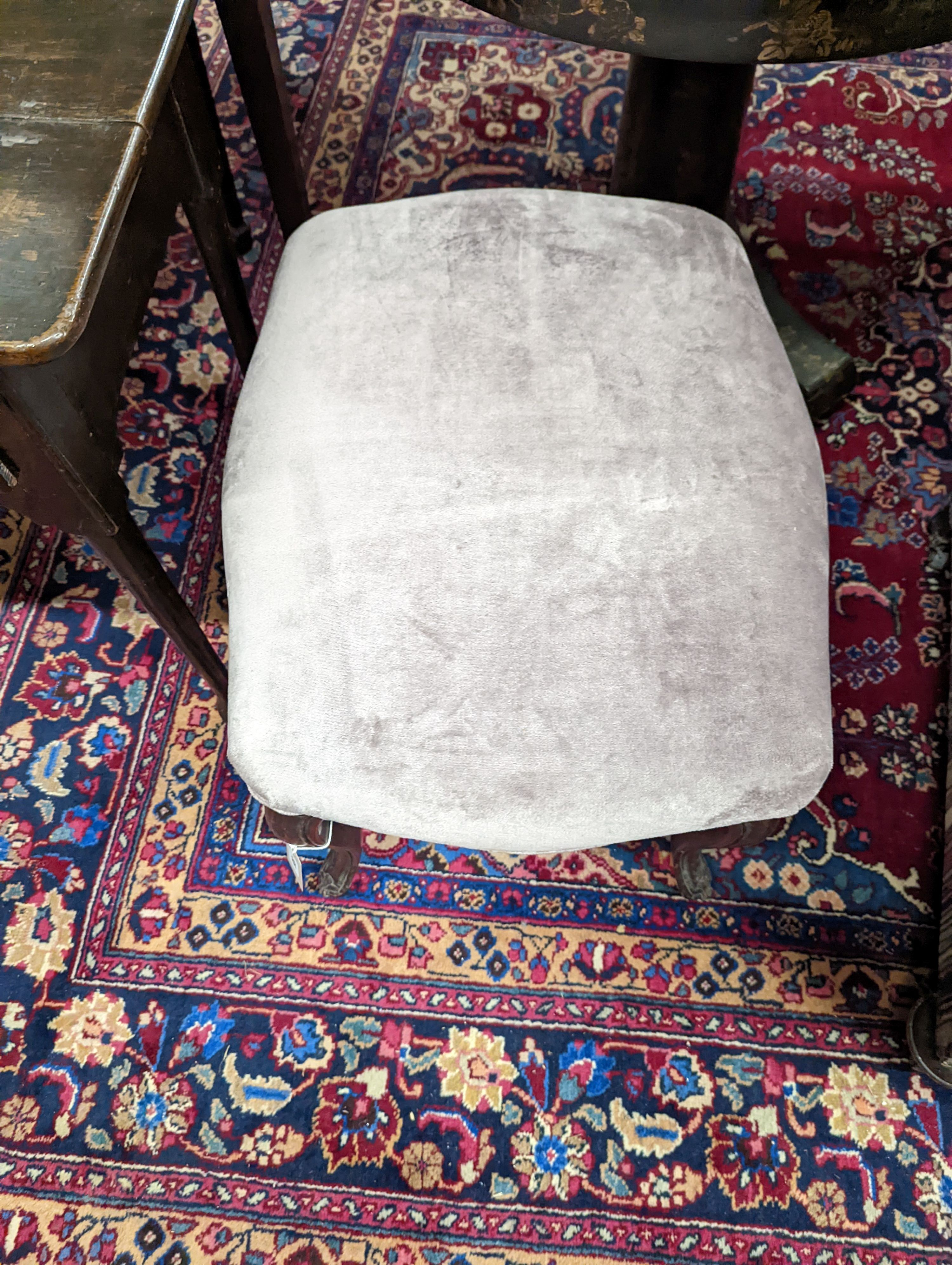 A Victorian mahogany upholstered footstool. H-47cm